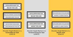 Image of shoulder height marker labels sewn onto child car seats
